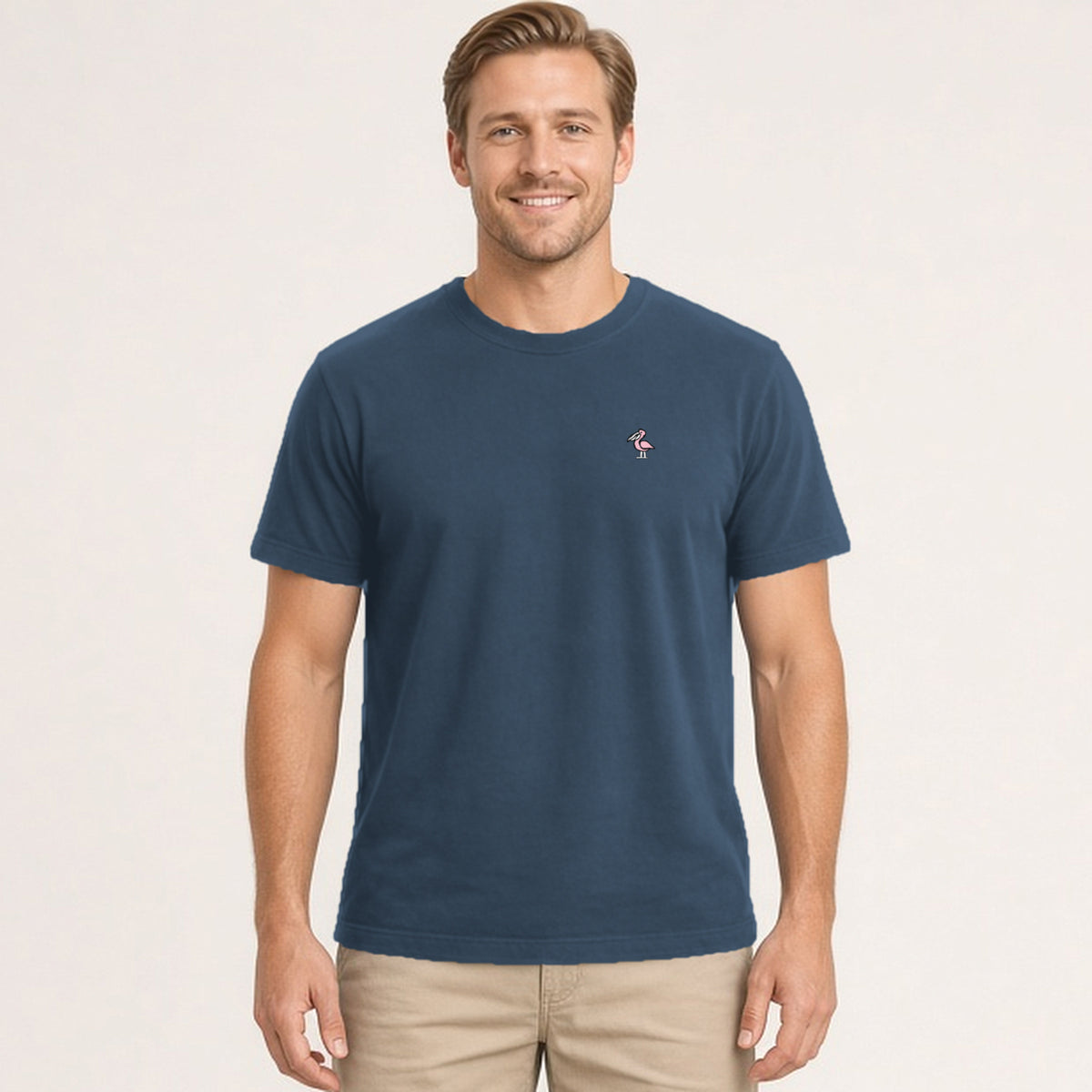 Boat Works Tee in Midnight, front with chest pelican, illustrative AI model